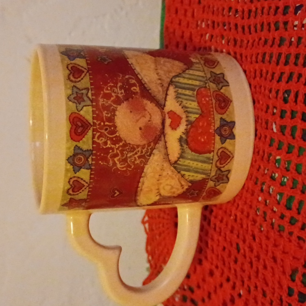 The sweetest coffee cup with heart shaped handle, no brand.